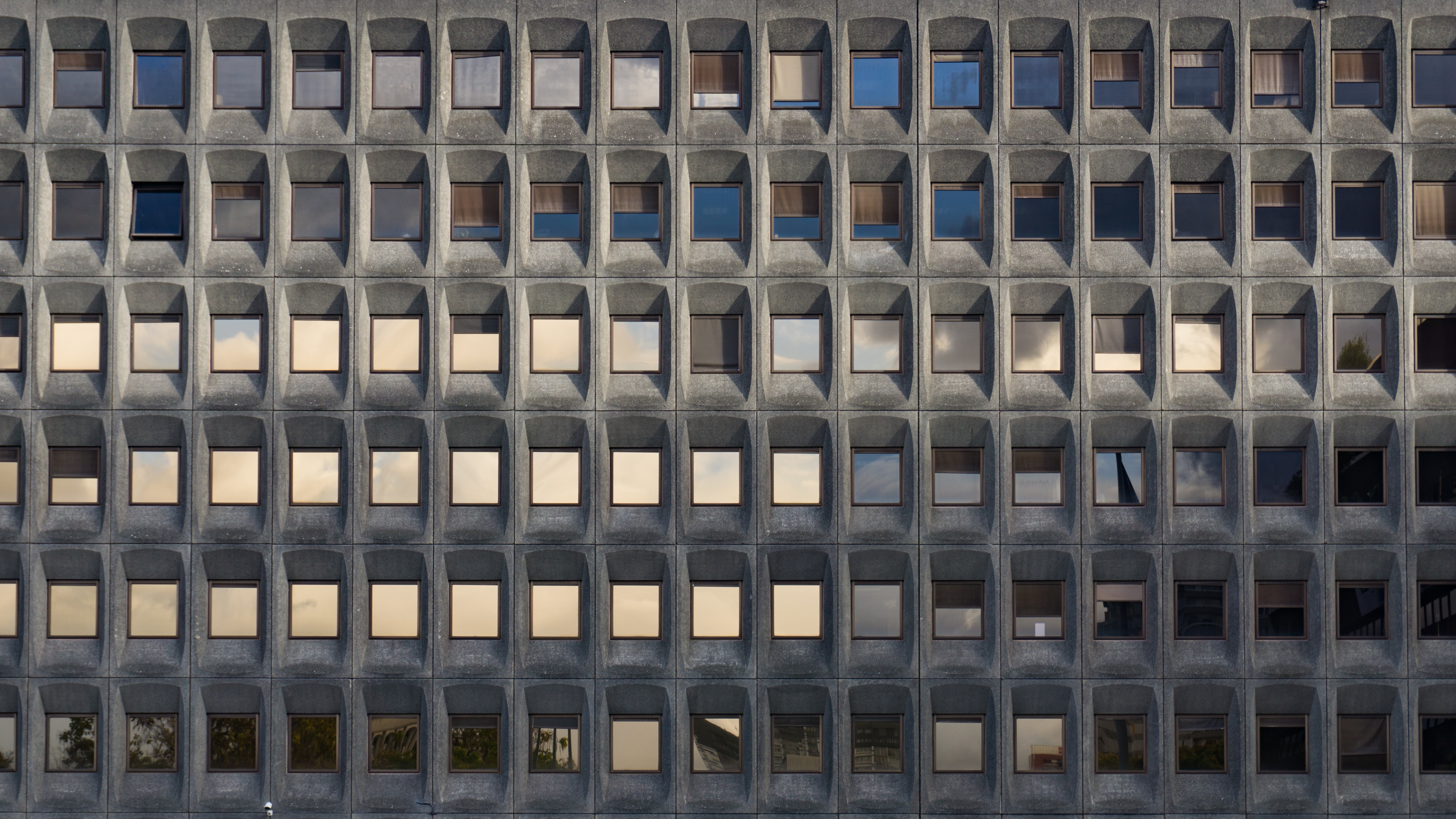 Photograph of the wide expanse of windows on the Prefecture of Bobigny